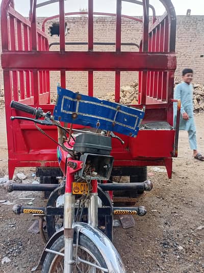 Loder rikshaw condition 10/6 rikshaw shi chalta ha 125 ka engine  ha