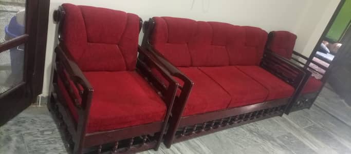 Complete Sofa set with table and cushions.