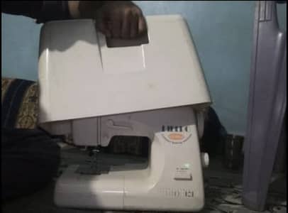 SINGER | KN-300DX Sewing Machine - 12 different stitches
