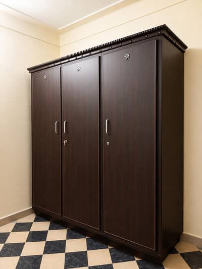 three door wardrobe, of large capacity