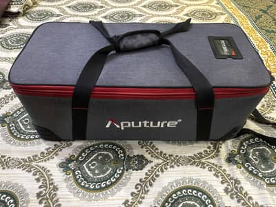 Aputure light storm COB 300d Studio Light with 2 Umbrellas
