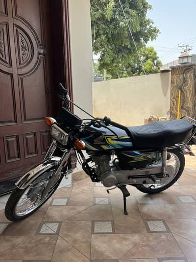 Honda 125 open letter new condition only 1200 driven