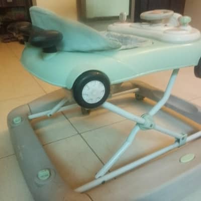 I m selling kids walker in gud frame as well
