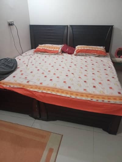 2 single beds with  master ortho matresses along with side table