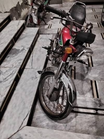 Honda CD 70.  mobile number 03157702085