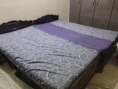 Two Single beds with mattresses made of pure wood for sale.