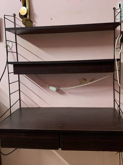 Study table with book shelves and light bulbs