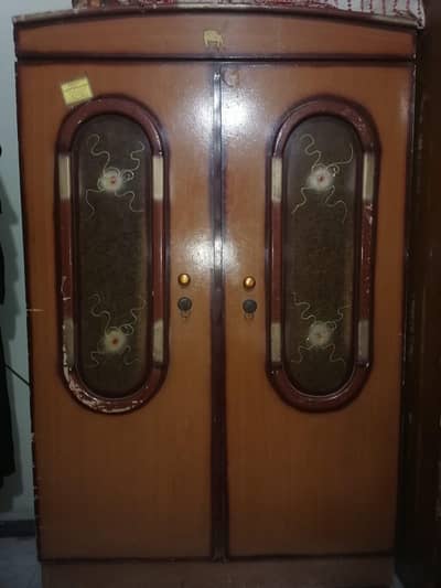 Wooden wordrobe/Almirah for urgent sale. Usable condition.