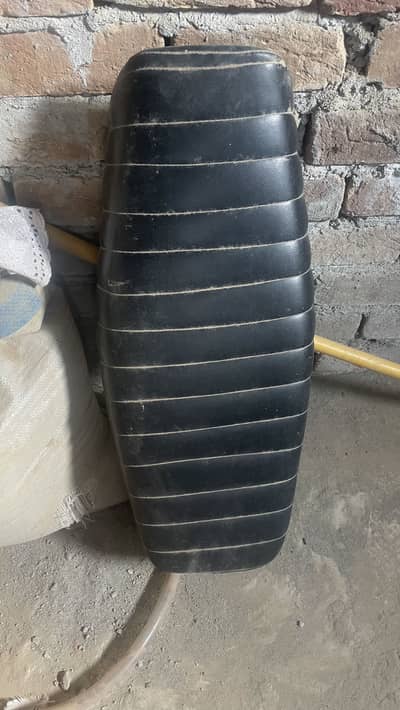 Cafe racer seat or exhaust