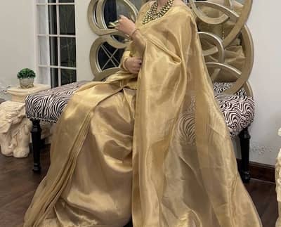 GOLDEN TISSUE SAREE WORN ONCE 16950