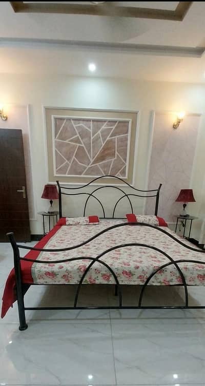 strong irom bed with side tables and 3 tear stand