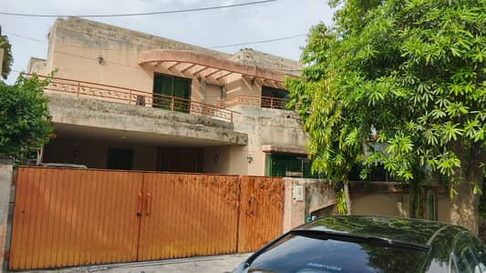 20-Marla Bungalow For Sale At Prime Location Of DHA Lahore Near To Park, Masjid And Commercial Market.