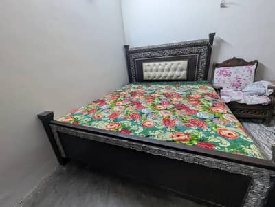 Wooden double bed