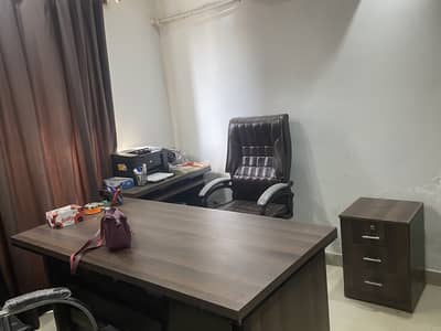 Executive office table with Executive Chair and other office furniture
