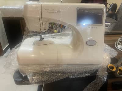 Janome machine new/ untouched 9000 model