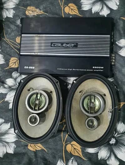 Kenwood Sound System with Caliber Amplifier