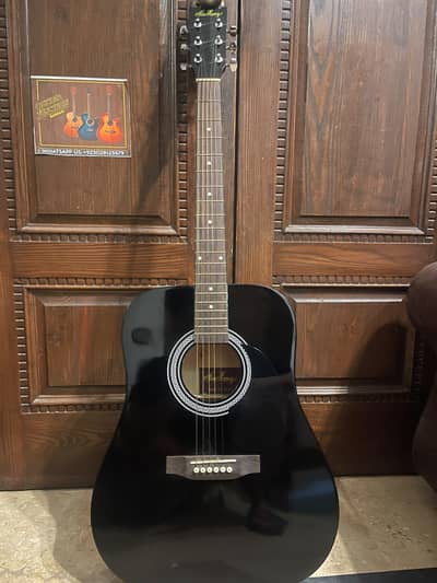 accoustic jambo guitar new condition