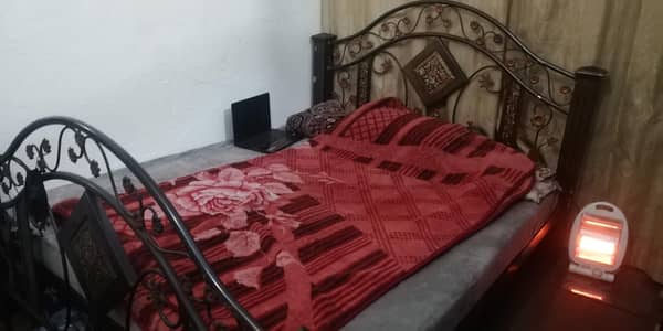iron double bed with mattress side tables and dressing