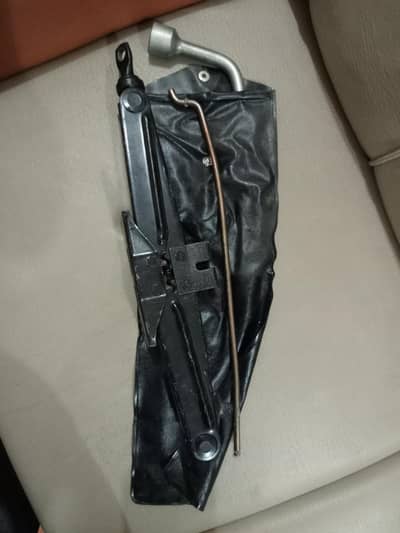 Toyota branded car jack, towing rod, anti theft wheel lock
