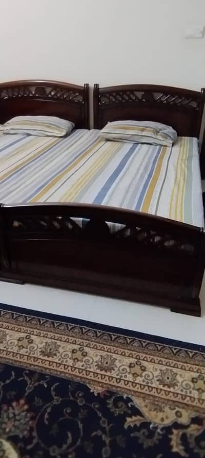 2 single sheesham beds