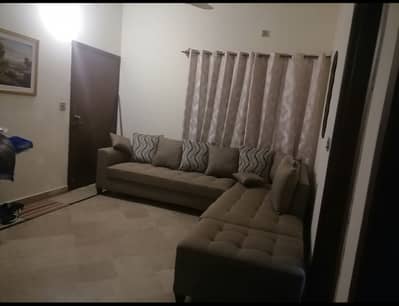 L-shape Sofa Set - Excellent Condition with Covers Included.