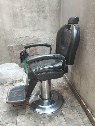 hair cutting chair for sale with a baby seat.