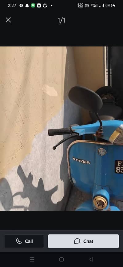 Blue petrol scooter