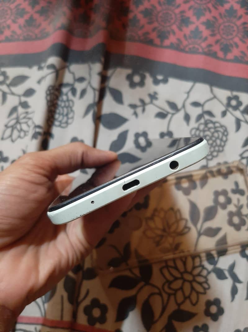 Redmi A2+ 1