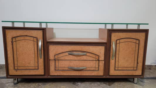 wooden media console with glass top