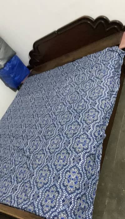 Hard wooden bed