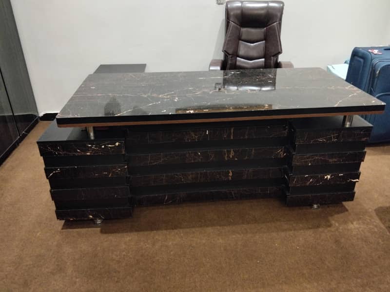 executive table with a one condition 3