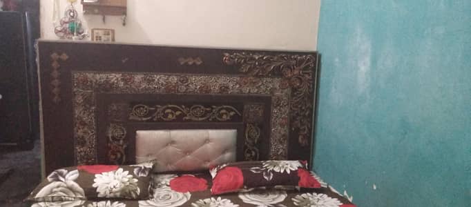 wooden double bed