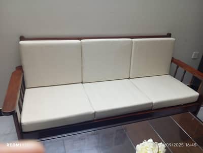 2 wooden sofa sets