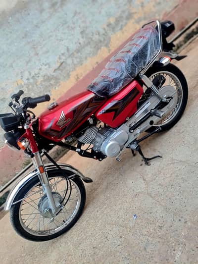 Honda 125 urgent sale total genuine Use bike look like new