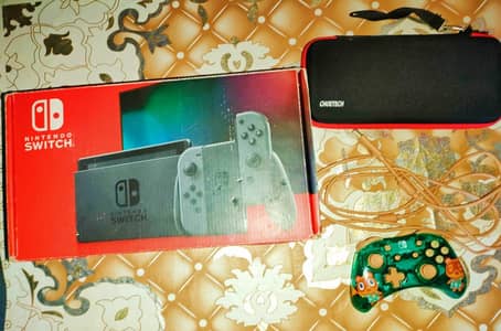 Nintendo switch v2 -9/10 condition+2 boxes+Extra controller-chakwal