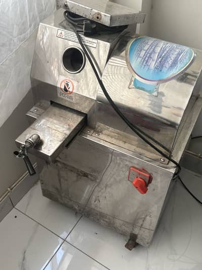 Sugarcane juice machine