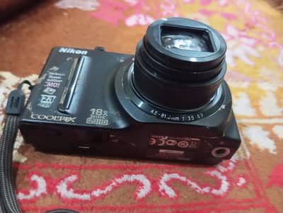 Nikon COOLPIX S9100 12.1 MP CMOS Digital Camera with 18x ZOOM
