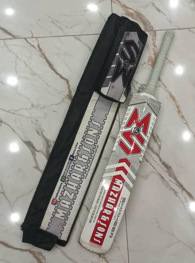 M&S original sri Lankan coconut wood tape ball bat with pocket cover