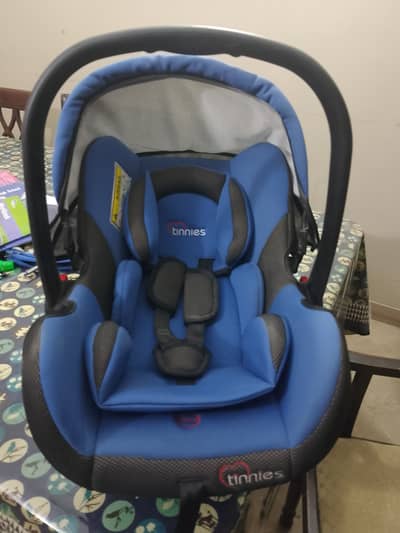 Tinnies baby carry cot and car seat