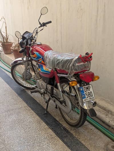 honda cd 70 sirf 1300 km chli hue ha