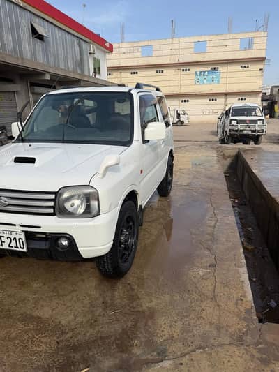 Suzuki Jimny mazda logo 2011 mdel import 2016