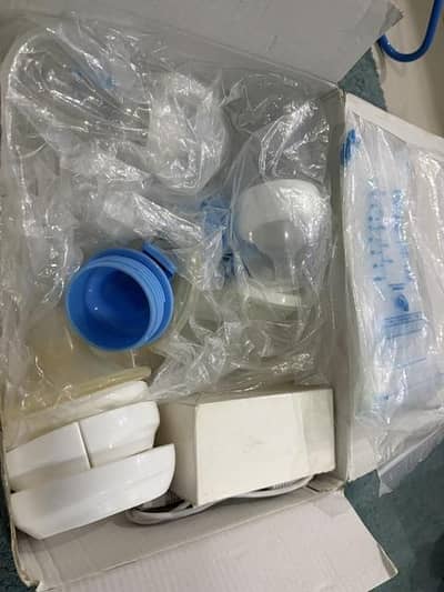 Electric breast pump/ chargable/ dual/ imported