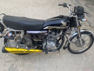 Honda 125 special edition golden number 295