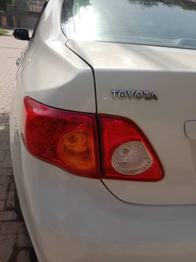 Toyota Corolla XLI 2010 rabta no 0 3 4 5 7 8 9 5 0 7 6