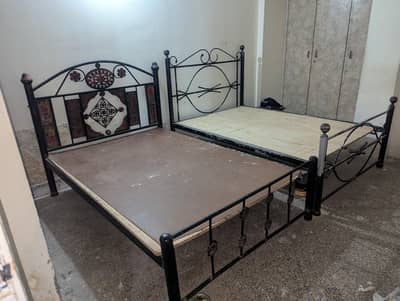 iron single beds