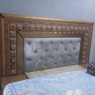 wooden king size bed with side table with dressing table