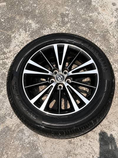 Toyota Corolla Grande original rims with yokohama tyres 16 inch rims