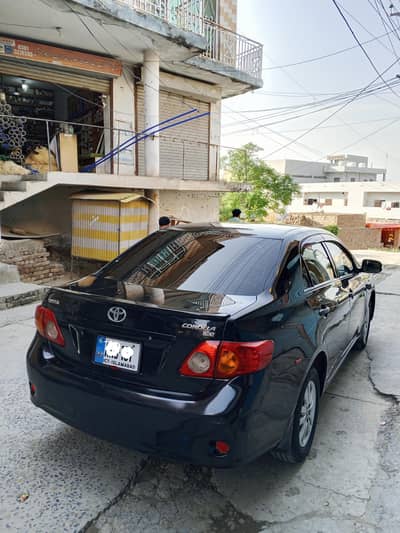 Corolla gli 2009 model Islamabad number