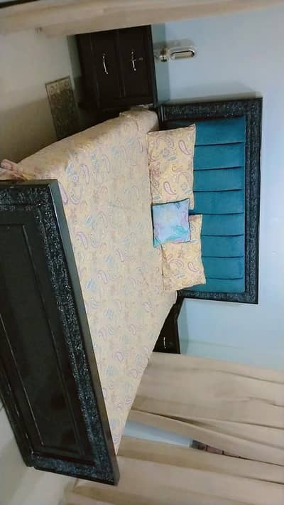 wooden king size bed with 2 side table