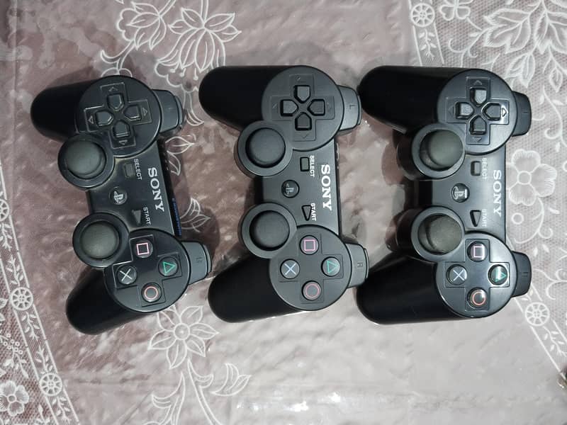 ps3 wireless controller and dual shock 3. .  3 controller price is 4000 0